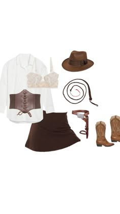 a woman's outfit with boots, hat and lasso on the ground next to her