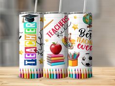 two personalized school cans with pencils and an apple on them, sitting on a wooden table