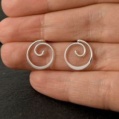 These earrings are made with 1 mm sterling silver wire. They come with silicone stoppers to keep them secure in place.  Measurements: Length: 12 Millimetres; Width: 12 Millimetres ✩ The item comes in a branded gift box- perfect for gifting.  ✩ All items are handcrafted by myself and every effort is taken to produce a high quality product.  ✩ If you have particular questions, send me a message! I am also doing jewelry upon request, so if you have an idea of what you want me to make for you, please get in touch to talk about it! Everyday Jewellery, Circle Stud Earrings, Simple Stud Earrings, Earrings Everyday, Circle Earrings Studs, Hammered Sterling Silver, Earrings Simple, Circle Studs, Earrings Minimalist