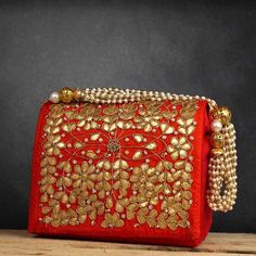 Salamender Orange Hand Crafted Clutch Handbag With Beaded Chain For Women | indian wedding evening bag clutch | fabric clutch purse handmadeHandmade Gotta Patti Work Clutch(For Traditional Indian Wedding) Suitable for every special occasion.Add grace to your dressings.Perfect For Weddings.These bags can be also used for gift purpose . Festive Mirror Work Clutch As A Gift, Gold Rectangular Clutch With Zari Work, Festival Reception Potli Bag With Zari Work, Embroidered Potli Bag For Diwali Evening, Elegant Bag With Mirror Work For Diwali, Bollywood Style Potli Bag With Dori Work For Reception, Gold Bag With Resham Embroidery For Reception, Bollywood Style Embroidered Evening Potli Bag, Traditional Potli Bag With Dori Work For Reception