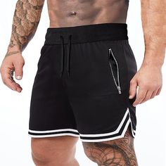 Season:Summer; Fabric:Polyester; Gender:Men's; Style:Gymnatics; Elasticity:Micro-elastic; Occasion:Sports,Going out,Weekend; Fit Type:Regular Fit; Function:Quick Dry,Running,Breathable,Casual; Waistline:Natural; Pattern:Plain; Design:Pocket,Drawstring,Elastic Waist; Pants Type:Basketball Shorts,Running Shorts,Gym Shorts,Athletic Shorts; Listing Date:12/18/2023; Hips:; Length:; Waist:; Pants Length:Knee Length Sports Fit, Active Shorts, Gym Shorts, Plain Design, Basketball Shorts, Type Of Pants, Pants Length, Pocket Pants, Shorts Athletic