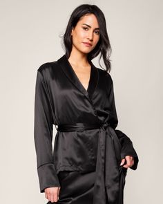 Head to sleep in simple sophistication. This versatile, serene black Robe is fabricated in 100% Mulberry Silk, offering a cozy feel that gets softer over time. This 22mm mulberry silk has the longest, strongest fibers of any silk. That means smoothness, durability, and a beautiful sheen. The machine-washable silk is inherently breathable, temperature-regulating, and hypoallergenic. In our exquisite sleepwear, you will be tucked in love and off to dreamland. Bridal Slippers, Christmas Traditions Family, Loungewear Dresses, Pink Holiday, Matching Baby, Silk Shorts, Linen Shop, Silk Twill, Short Pajama Set