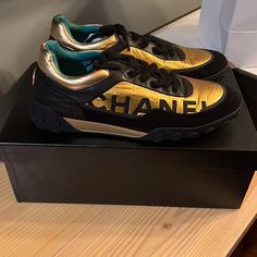 Brand New, Never Tried On, Never Worn. Sold Out Everywhere In The Us, Very Rare Black, And Gold Men’s Chanel Sneaker, Size 46. Original Box, And Receipt Included Chanel Men, Chanel Sneakers, Gold Chanel, Chanel Shoes, Mens Shoes Sneakers, Black And Gold, Very Rare, Original Box, Men's Shoes