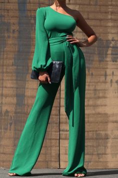 One Shoulder Jumpsuit - Dark Green This jumpsuit is a statement in itself! Perfect for date night or brunch with the ladies! This green jumpsuit comes in a wide pant leg featuring a long sleeve one shoulder, adjustable tie belt, and side zipper. Pair this with a stylish heel and handbag for a complete look. One Shoulde Green Long Sleeve Party Jumpsuits, Green Long Sleeve Jumpsuits And Rompers For Party, Chic Green Long Sleeve Jumpsuits And Rompers, Elegant Green Strapless Jumpsuit For Night Out, One-shoulder Jumpsuits And Rompers For Spring Date Night, Green Wide Leg Jumpsuits For Party, Green Wide Leg Jumpsuits And Rompers For Party, Green Wide-leg Jumpsuits For Party, Chic Green One-shoulder Jumpsuits And Rompers