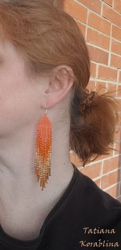 These unique handmade earrings are made of high-quality Czech beads and strong synthetic thread. They are elegant, fashionable, and highly versatile, suitable for everyday wear. Color: orange, gold, bronze . There may be some color discrepancies which is due to the different monitor settings I will make these earrings for you in your favorite size. 100% hand made with love! Measurements: Length-about 11cm (4.3 inch) Width -about 2 cm (0.79 inch) Materials: Sterling silver components Czech glass Orange Tiny Beads Drop Earrings, Orange Beaded Drop Earrings, Orange Drop Earrings With Tiny Beads, Orange Adjustable Beaded Drop Earrings, Adjustable Orange Beaded Drop Earrings, Handwoven Orange Beaded Earrings For Gift, Handwoven Orange Beaded Earrings As Gift, Orange Handwoven Dangle Beaded Earrings, Adjustable Orange Tiny Beads Earrings