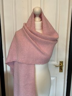 Hand woven scarf using wool consisting of cotton, acrylic and wool.  A beautiful soft pink scarf with a subtle sparkle or shimmer running through.  This large size scarf measures 190cm  long (plus the fringes) and 37cm wide (Approx.) Hand wash only, dry flat Pink Pashmina Shawl For Winter, Pink Winter Pashmina Shawl, Hand Woven Scarf, Woven Scarf, Handwoven Scarf, Woven Scarves, Pink Scarf, Pink Scarves, Shawls And Wraps