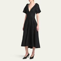 Bottega Veneta fluid viscose and linen midi dress features twist details at the shoulders V-neckline Short sleeves Hem falls below the knee A-line silhouette Concealed back zip  Viscose/linen Made in Italy Linen A-line Evening Dress, Formal V-neck Linen Dress, Elegant Linen V-neck Dress, Spring Evening V-neck Midi Dress, Formal Linen V-neck Dress, Spring Evening A-line V-neck Dress, Formal Linen Dress Midi Length, Formal Linen Midi Length Dress, Evening A-line Linen Dress