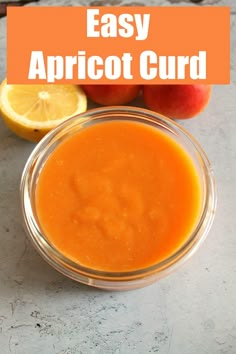 an apple and orange smoothie in a bowl with the words easy apricot curd above it