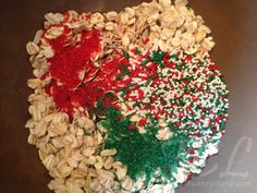 an italian flag made out of granola on top of a plate with red, white and green sprinkles