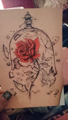 a drawing of a rose in a glass dome