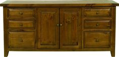 a large wooden cabinet with drawers and doors