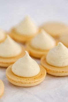 small cookies with white frosting on them