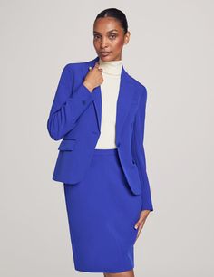 From the office to after-hours engagements, thisÂ Royal Saphire Skirt Suit SetÂ effortlessly embodies the essence of sophistication. Its versatile design allows you to create various looks, whether paired together for a polished ensemble or mixed and matched with other wardrobe staples to unleash your personal style. Jacket: Single button closure Single breasted Two front pockets Shoulder pads Faux buttons on sleeve Length: 24" Skirt: Invisible back zipper with hook and eye closure Two side pock Skirt Suit Set, Suit Set, Work Attire, Skirt Suit, Mix N Match, Anne Klein, Costume Ideas, Single Breasted, Shoulder Pads