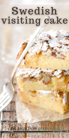 two pieces of cake sitting on top of each other with the words swedish visiting cake written below