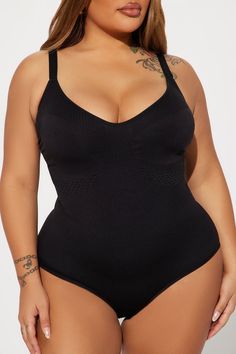 Available In Black, Charcoal, Chocolate, And Nude. Shapewear Bodysuit Smooth Shaper Snap Bottom Closure Ribbed Seamless Adjustable Straps Fitted Full Stretch Final Sale 92% Nylon, 8% Spandex Imported | Snatched Body Shapewear Bodysuit in Black size XL by Fashion Nova Stretch V-neck Bodysuit For Workout, Black Shapewear Swimwear, Stretch Shapewear Bodysuit For The Beach, Beach Shapewear Stretch Bodysuit, Beach Shapewear Bodysuit, Sculpting Sleeveless Bodysuit With Medium Bust Support, Black Sleeveless Smoothing Bodysuit, Fitted Seamless Bodysuit, Sleeveless Black Smoothing Bodysuit