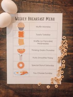 breakfast menu with eggs and cereals on wooden table next to doughnut buns