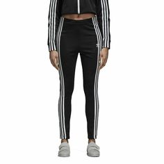 [DH2719] Womens Adidas Originals Superstar Track Pant WHY PURCHASE FROM US? Free shipping and free returns on all orders within the US Always 100% authentic We ship within 24 hours (not including weekends or holidays) All items ship from our facility in the US (New Jersey) All sizes are quoted in US sizes Your order will ship via USPS or UPS with a traceable tracking number 30 Day return policy Quick response to customer inquires High feedback score Ship all items in secure packaging Internation Track Pants Women, Adidas Classic, Womens Adidas, Tracksuit Pants, Casual Bottoms, Adidas Track Pants, Adidas Womens, Adidas Originals Women, Adidas Originals Superstar