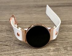 High Quality White Genuine Leather Strap Band Compatible with : Galaxy Watch (42mm) | Galaxy Watch Active | Watch Active2 (40mm) | Watch Active2 (44mm) | Adjustable Size Bracelet Perfectly Tailored to Fit Your Wrist. Designed And Handmade by Simeon D Jewelry. The Bracelet is Super Easy to Install on Your Watch. Comes with 4pcs 20mm Quick Release Pins. Please Measure Your Wrist Before Submitting Your Order! Samsung Watch Is NOT Included Create Your Own Unique Style! Be Different! Be Unique! Make Gold Watch Band, Gold Galaxy, Samsung Watch, Leather Rose, Rose Gold Bracelet, Rose Gold Watch, Quick Release, Watch Band, Gold Watch