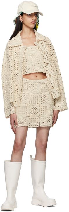 Open crocheted organic cotton jacket. · Spread collar · Button closure Supplier color: Ecru Cream Cotton Crochet Top For Fall, Beige Cotton Crochet Top For Fall, Fitted Crochet Cotton Outerwear, Beige Long Sleeve Crochet Cotton Top, Beige Crochet Cotton Cardigan, Beige Crochet Outerwear For Spring, Cream Crochet Long Sleeve Outerwear, White Crochet Cotton Outerwear, White Cotton Crochet Outerwear