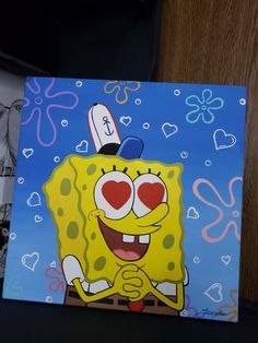 a painting of spongebob with hearts on it