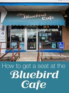 the bluebird cafe is located at the corner of an intersection and has a sign that says how to get a seat at the bluebird cafe