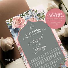 a welcome card with flowers on it next to a pink envelope and flower bouquets