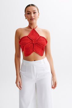 FlourishThe BAILEY Floral Crochet Halter Top is a stunning expression of artisanal craft and bohemian style, ideal for adding a touch of elegance to any casual or dressy ensemble. This top features a halter neckline that beautifully frames the neck and shoulders, making it a flattering choice for all body types. The front is adorned with intricate crochet flower details that provide a vibrant, eye-catching element. Made entirely from crochet, this top offers a breathable and comfortable fit, per Capsule Wardrobe Basics, Crochet Halter Top, Intricate Crochet, Jacket Making, Flower Top, Maxi Dress Sale, Crochet Halter, Crochet Halter Tops, Floral Crochet