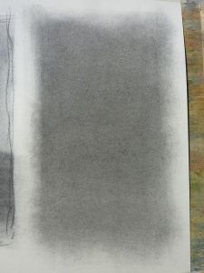 a piece of paper that has been drawn with charcoal and white pastel on it