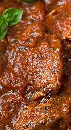 closeup of meat and sauce in a bowl