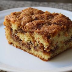 a piece of cake sitting on top of a white plate