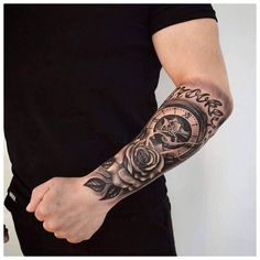 a man with a tattoo on his arm