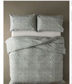 two pictures of the same bedding with different colors and patterns, one in grey and white