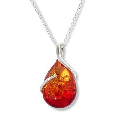 Amber Extraordinaire Sterling Silver Pear Ombré Stone Pendant A single, sterling vine stretches around the glistening amber showcased on this pendant with chain pairing, such a romantic find.           Pendant approx. 1-1/2"L x 3/4"W     Chain approx. 18"L x 1/16"W with 1-1/2" extender     Stamped .925 sterling silver; polished finish      Pendant: fixed, pull-through bail     Anchor-link chain with amber accent bead: spring-ring clasp     Stone Information       All sizes and weights approximat Amber Teardrop Necklace With Polished Finish, Polished Teardrop Amber Necklace, Baltic Amber Necklace With Round Pendant, Round Baltic Amber Pendant Necklace, Round Pendant Baltic Amber Necklace, Amber Teardrop Sterling Silver Jewelry, Baltic Amber Round Pendant Necklace, Baltic Amber Necklaces As Gifts, Elegant Amber Teardrop Pendant Necklaces