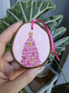 pretty in pink   💕 Approx 3" inch diameter 🎄 Hand painted pine wood slice sealed with satin varnish and hung on a matching ribbon 💖 Hand painted by Nikki B Pink Glitter Christmas, Clay Christmas Decorations, Glitter Christmas Tree, Salt Dough Ornaments, Dough Ornaments, Clay Christmas, Christmas Tree Painting, Christmas Wood Crafts