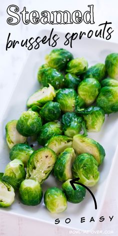 brussel sprouts on a white plate with the words steamed brussels sprouts