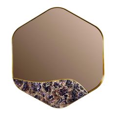 an image of a mirror that is in the shape of a hexagonal object