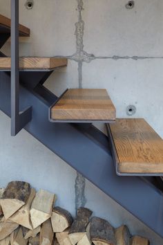 the stairs are made of wood and steel