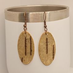 Experience the unparalleled elegance of birch bark, where each piece boasts a distinct uniqueness that defies replication. Embrace the charm of these one-of-a-kind earrings, crafted from darker-toned birch bark, showcasing a length of 2 1/4 inches with ear wire for added allure. Birch Bark Earrings, Birch Bark, Ear Wire, Sale Items, Personalized Items