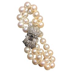 An original Art Deco period bracelet done in platinum and set with approximately 2.60cttw in H-J color Vs1-Si2 clarity old European cut diamonds attached to a double strand of 7mm cultured pearls with platinum separators. Dimensions/Weight 6.50” long and .50” wide. Weighs 17.4dwt. Condition All stones secure and in very wearable condition. May we all age as well. Vintage Gold And Platinum Bracelets, Art Deco Pearl, Bracelet Art, Pearl Bracelets, Vintage Bracelet, Art Deco Period, Deco Jewelry, European Cut Diamonds, Pearl Diamond