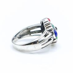 Vintage Sterling Silver Multi-Stone Ring Size 9.25. This Sterling Silver cluster ring features a variety of gemstones including turquoise, gaspeite, spiny oyster, coral, lapis, and onyx. Ring is pre-owned and in great condition. Buy with confidence knowing that all precious metals are tested and are guaranteed with the Thermo Scientific Niton DXL Xray Scanner. All gemstones are authenticated using the Presidium Gem Tester II. Jewelry items come in a black velvet jewelry pouch or gift box and are Multicolor Multi-stone Opal Ring, Multicolor Gemstone Southwestern Rings, Southwestern Style Multicolor Gemstone Rings, Vintage Multicolor Multi-stone Turquoise Ring, Multicolor Multi-stone Turquoise Ring, Velvet Jewelry, Spiny Oyster, Onyx Ring, Multi Stone Ring