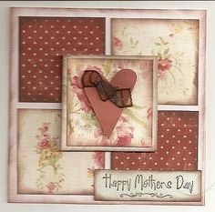 a mother's day card with a pink heart and ribbon on the front side