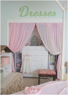 a bedroom with pink curtains and white furniture