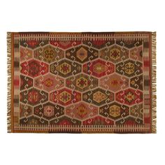 an old rug with many different colors and patterns on the carpet, including red, brown,