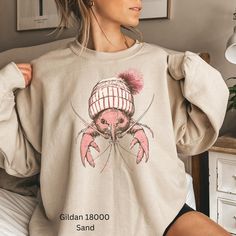 🦞 Get cozy with this cute oversized spiny lobster sweatshirt! Perfect for chilly days or just lounging at home. Great gag gift for lobster lovers! 🦞  Gildan 18000 Sweatshirt: A sturdy and warm sweatshirt bound to keep you warm in the colder months. A pre-shrunk, classic fit sweater that's made with air-jet spun yarn for a soft feel and reduced pilling. * 50% cotton, 50% polyester * Pre-shrunk * Classic fit with no center crease * 1x1 athletic rib knit collar with spandex * Air-jet spun yarn wi Spiny Lobster, Lobster Print, Print Sweater, Fitted Sweater, Printed Sweater, New T, Knit Collar, Getting Cozy, Air Jet