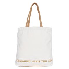 Authentic NEW Louis Vuitton beige and brown foundation shoulder bag tote. Features white canvas with light brown trim, open top closure. You're going to love it! Handle drop: 9.0" Beige Monogram Canvas Shoulder Bag With Large Capacity, Beige Large Capacity Monogram Canvas Shoulder Bag, Designer Large Capacity Canvas Bag, White Monogram Canvas Bag With Removable Pouch, Luxury White Rectangular Canvas Bag, Designer Beige Coated Canvas Bag, Beige Monogram Canvas Shoulder Bag For Daily Use, Cream Monogram Canvas Bag With Leather Handles, Cream Monogram Canvas Bags With Leather Handles