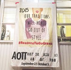 a banner hanging from the side of a building that reads, 2013 our traditionals will never go out of style