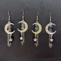 These enchanting silver crescent moon dangle earrings feature delicate star charms and  beautiful glass beads, offering a perfect blend of celestial charm and minimalist elegance. Handmade with care, these bohemian chic style earrings are ideal for daily wear or special occasions. Whether you're gifting for a birthday, anniversary, or just because, these earrings make a thoughtful and unique present. Lightweight and comfortable, they're perfect for adding a touch of the cosmos to your look. Get yours today! This is a new shop so please don't be discouraged by the low amount of reviews and orders so far. I appreciate your interest and support! Silver Chandelier Earrings With Dangling Charms As Gift, Celestial Moon Charm Crystal Earrings, Silver Crescent Earrings With Star Charm, Celestial Silver Earrings With Dangling Charms, Silver Celestial Earrings With Dangling Charms, Silver Moon Shaped Celestial Crystal Earrings, Silver Moon-shaped Celestial Earrings, Silver Moon-shaped Celestial Crystal Earrings, Silver Moon Shaped Crystal Earrings