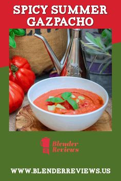 a white bowl filled with soup on top of a wooden cutting board next to tomatoes