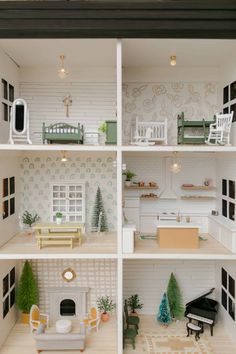 the inside of a doll house with furniture and accessories