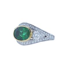 2.51ct Oval Emerald Cocktail ring featuring 0.72ct Total Weight of Large Roundnd Side Diamonds and 0.84ct Total Weight of Small Round Side Diamonds (All G/H Color, VS Clarity) in a Platinum Mounting with Yellow Gold Bezel. Emerald Cocktail Ring, Emerald Cocktail, G H, Cocktail Ring, Cocktail Rings, Two Tone, Platinum, Emerald, Jewelry Rings